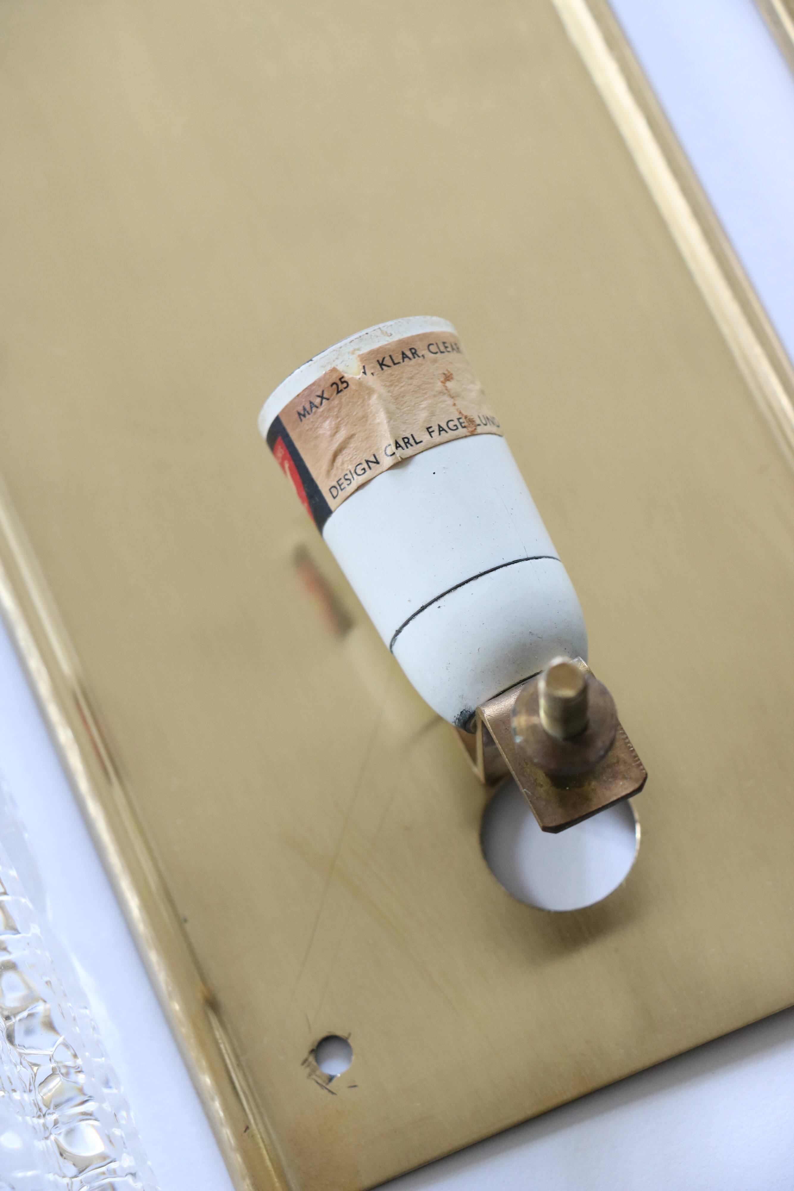 Pair of glass and brass sconces by Carl Fagerlund for Orrefors, 1960