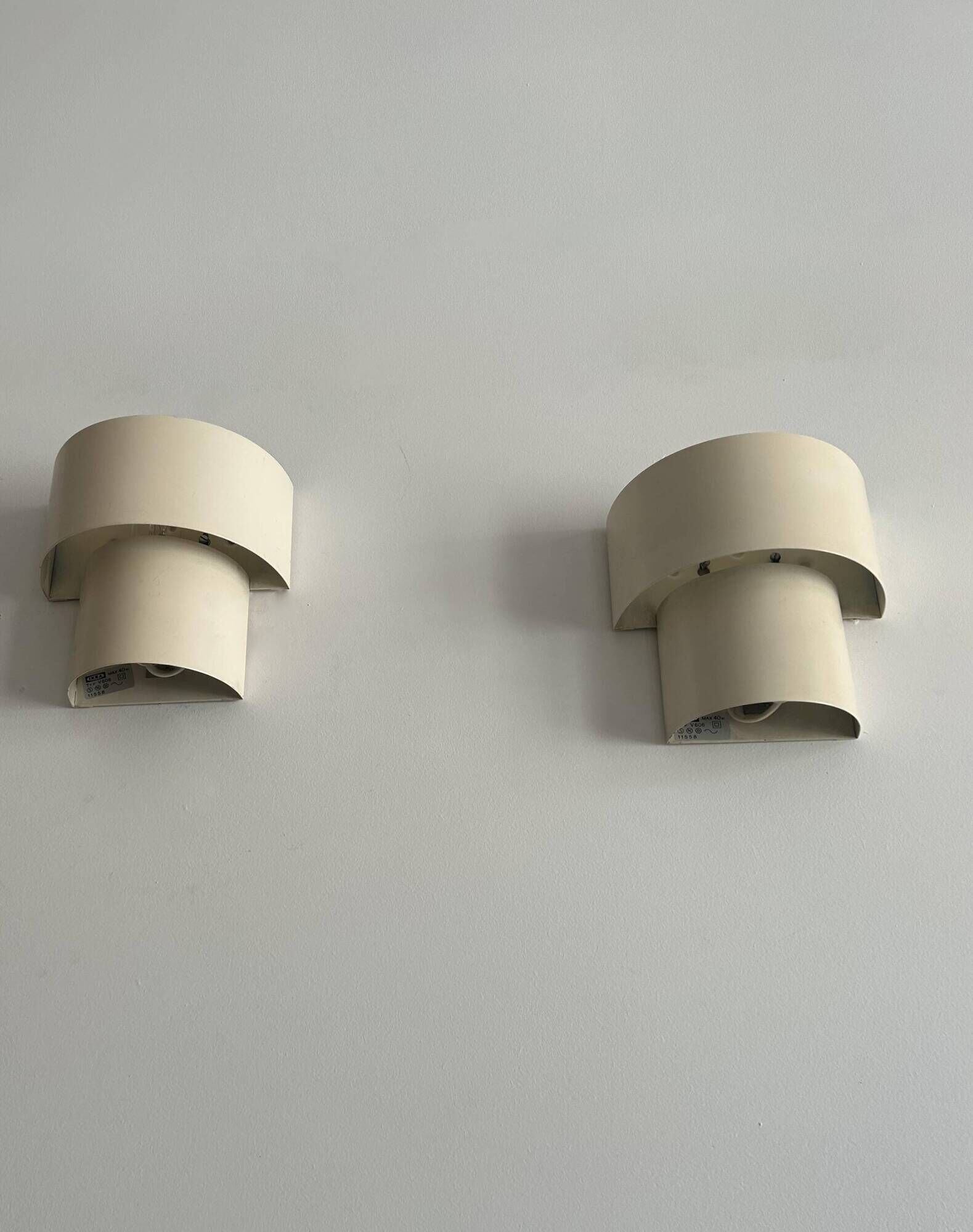 Pair of vintage modernist wall lights, white lacquered metal, Sweden 1970