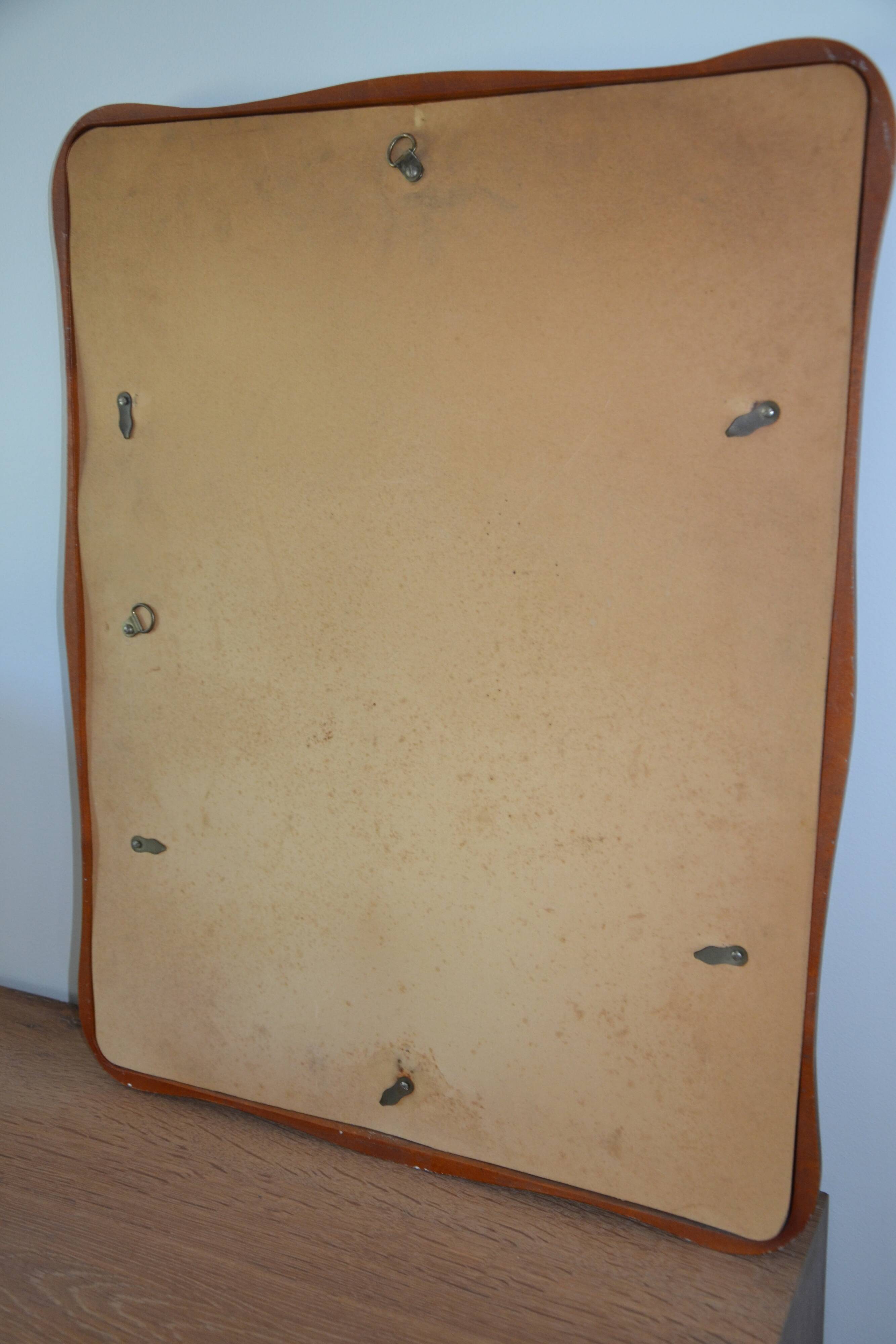 Vintage organic wavy cast resin mirror