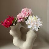 Organic-shaped vase in pyritic stoneware.