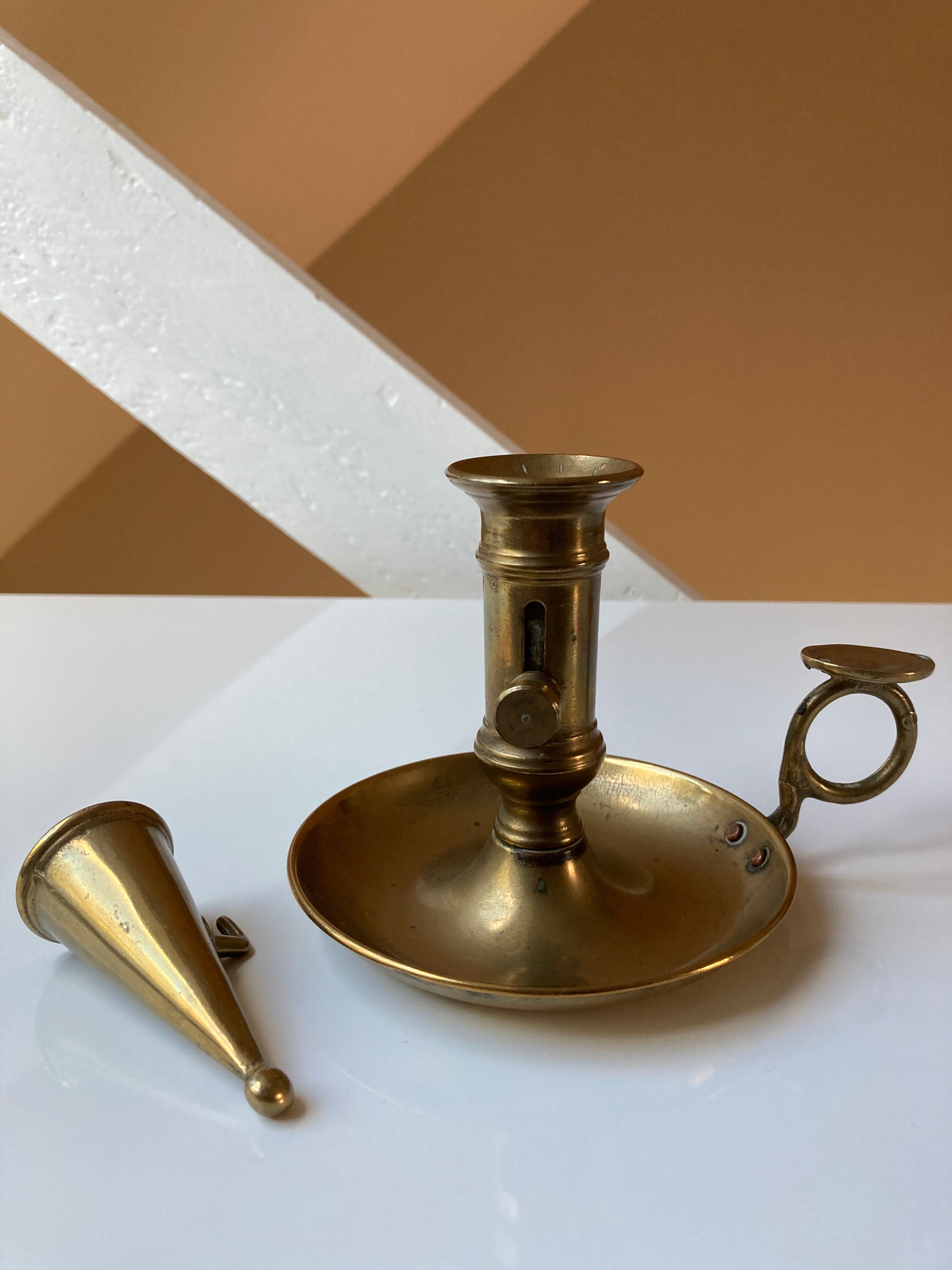 Brass hand candle holder
