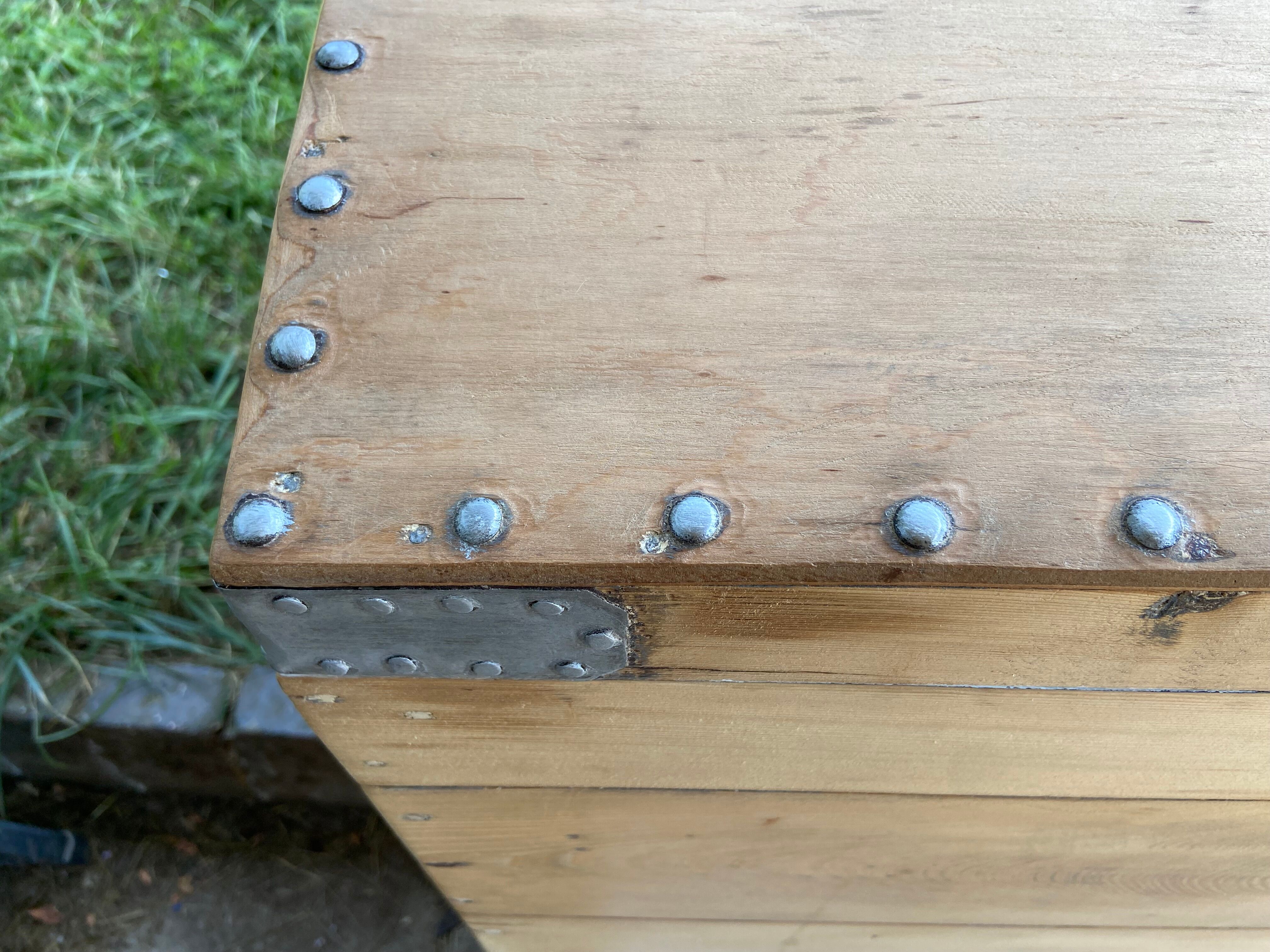 Raw wooden chest with a secret drawer