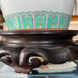 Chinese vase on wooden base