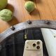 Brutalist round mirror with wrought iron and studs.