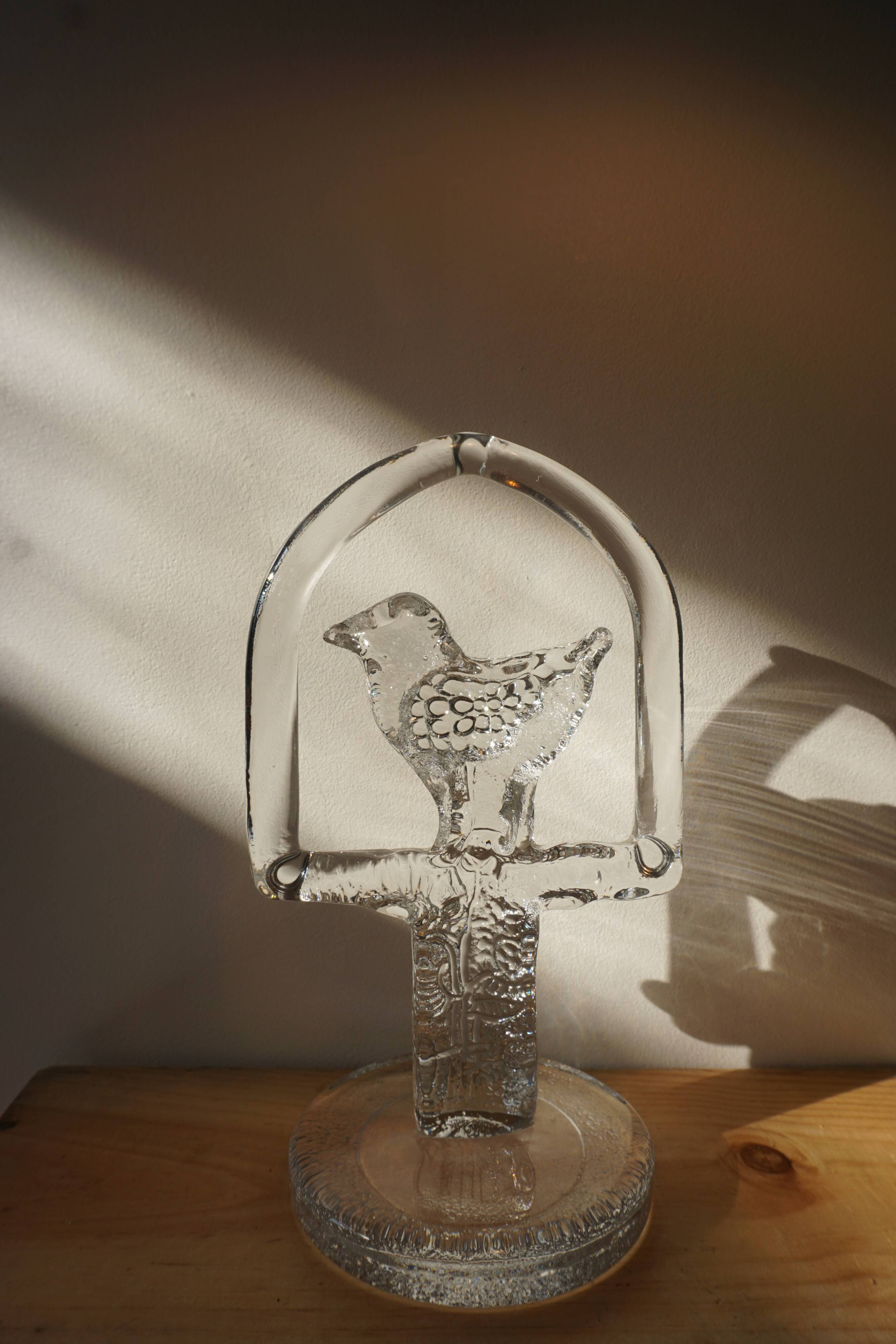 Glass bird suncatcher sculpture