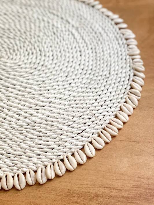 Large woven vegetable fiber placemat decorated with shells cowrie shells Bali