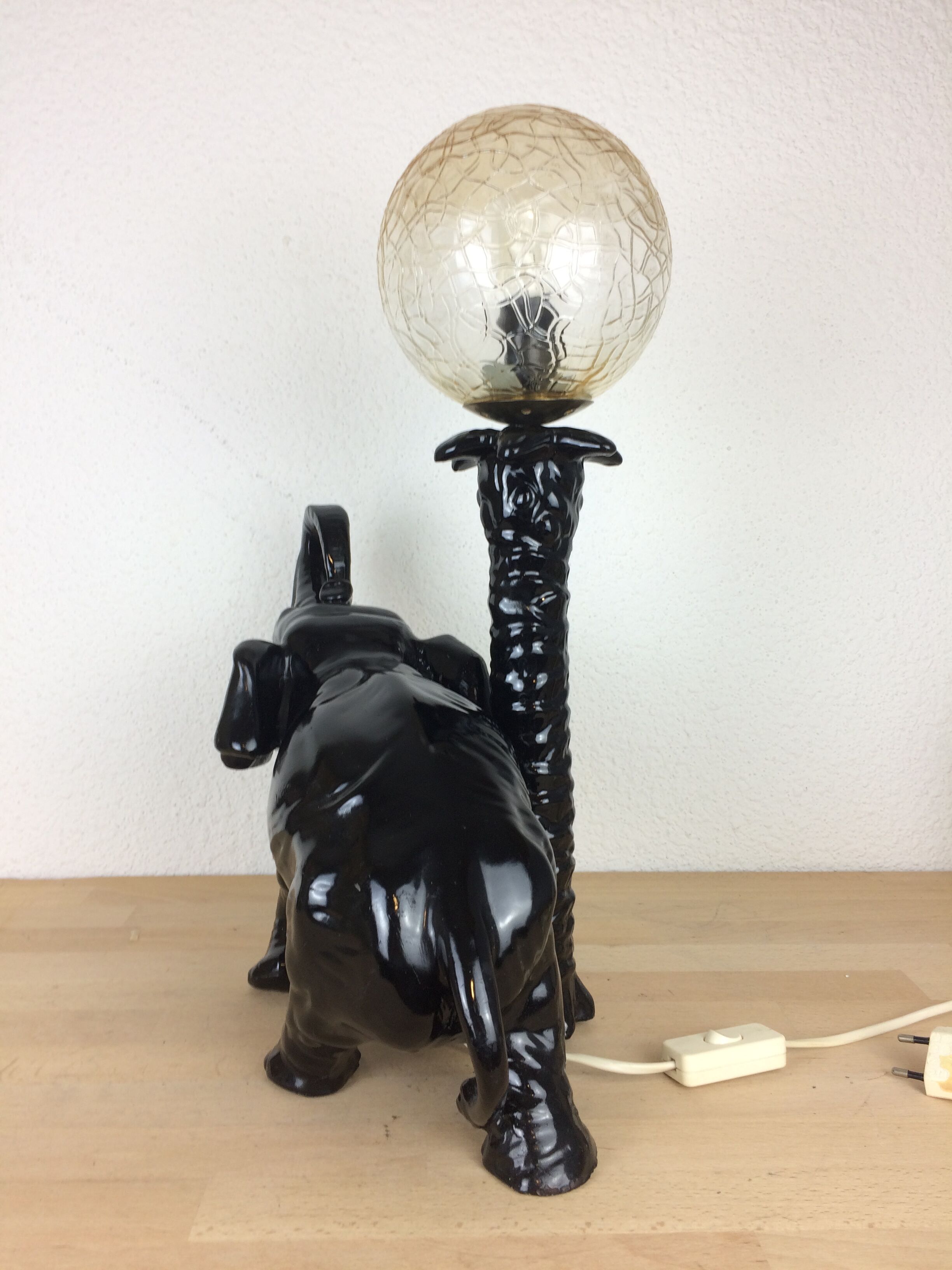 Elephant lamp and palm tree in black resin