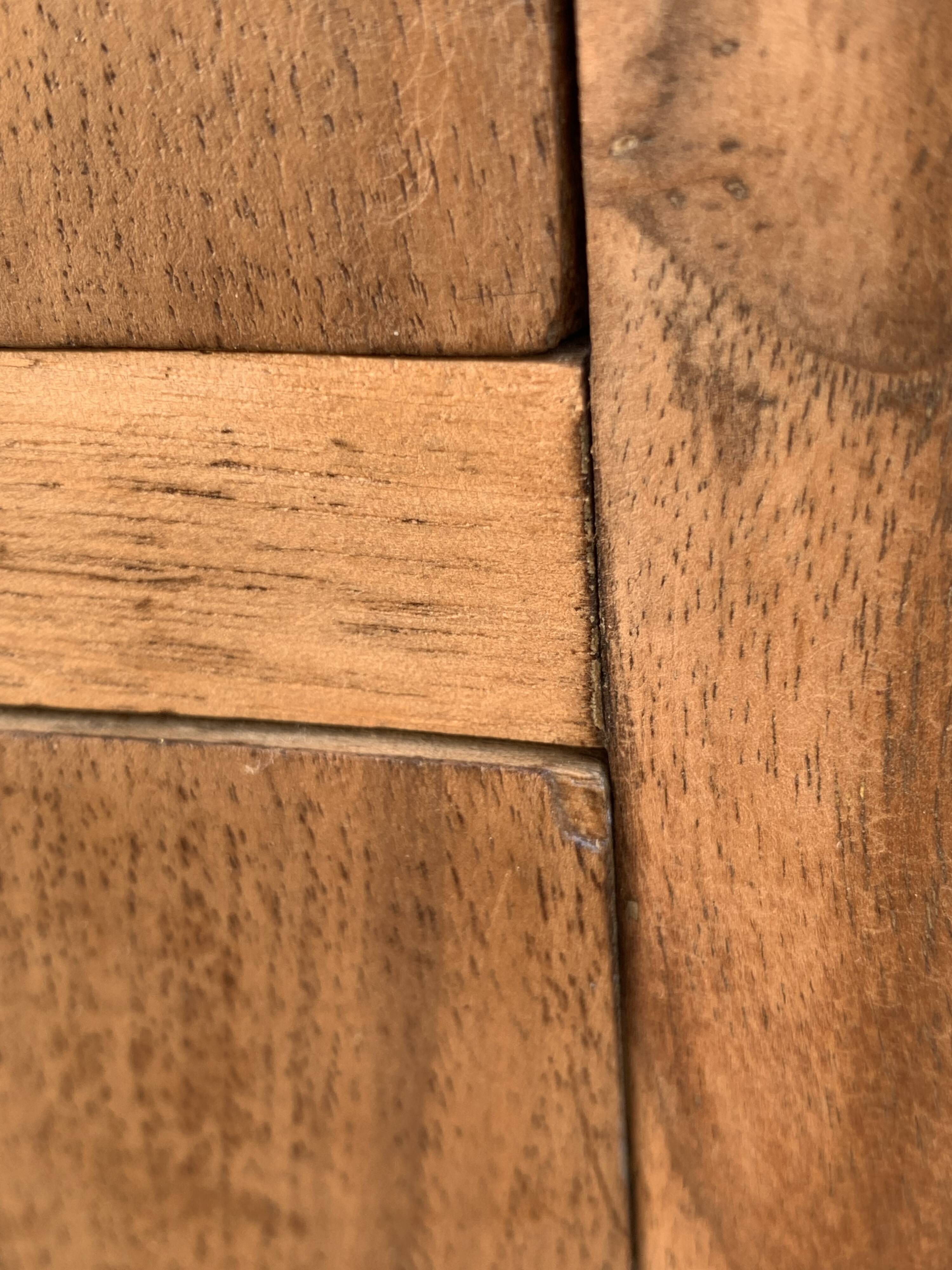 High art deco chest of drawers with mustache feet in raw walnut, 1930s