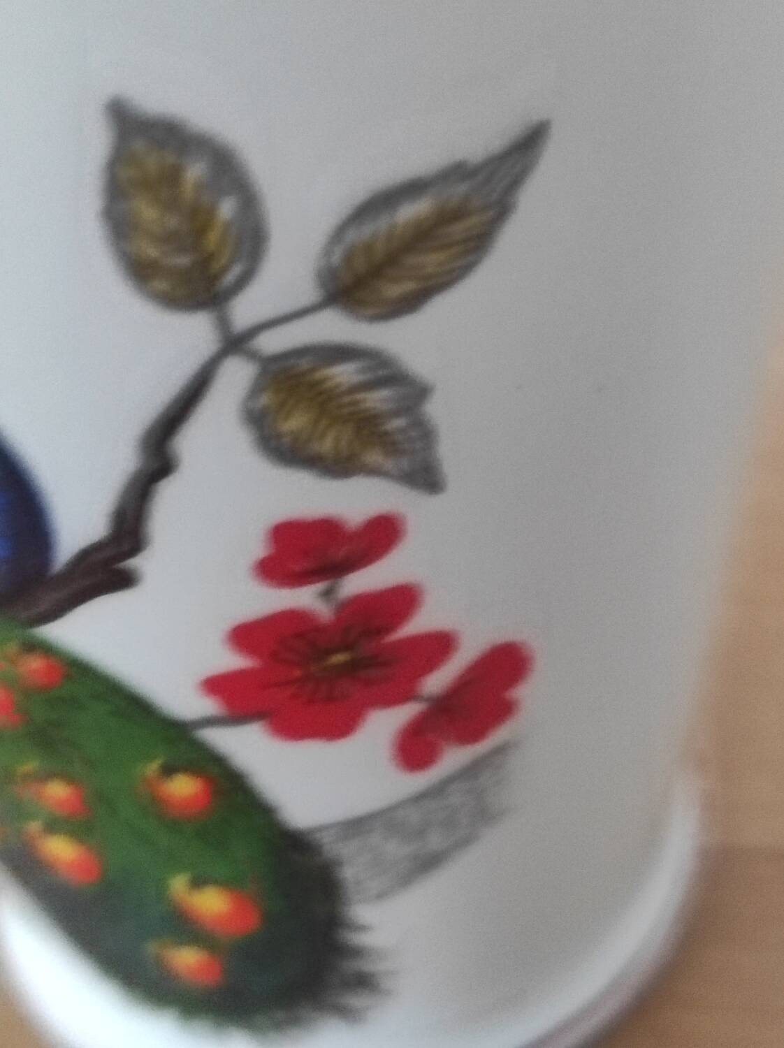 Porcelain vase with peacock decoration