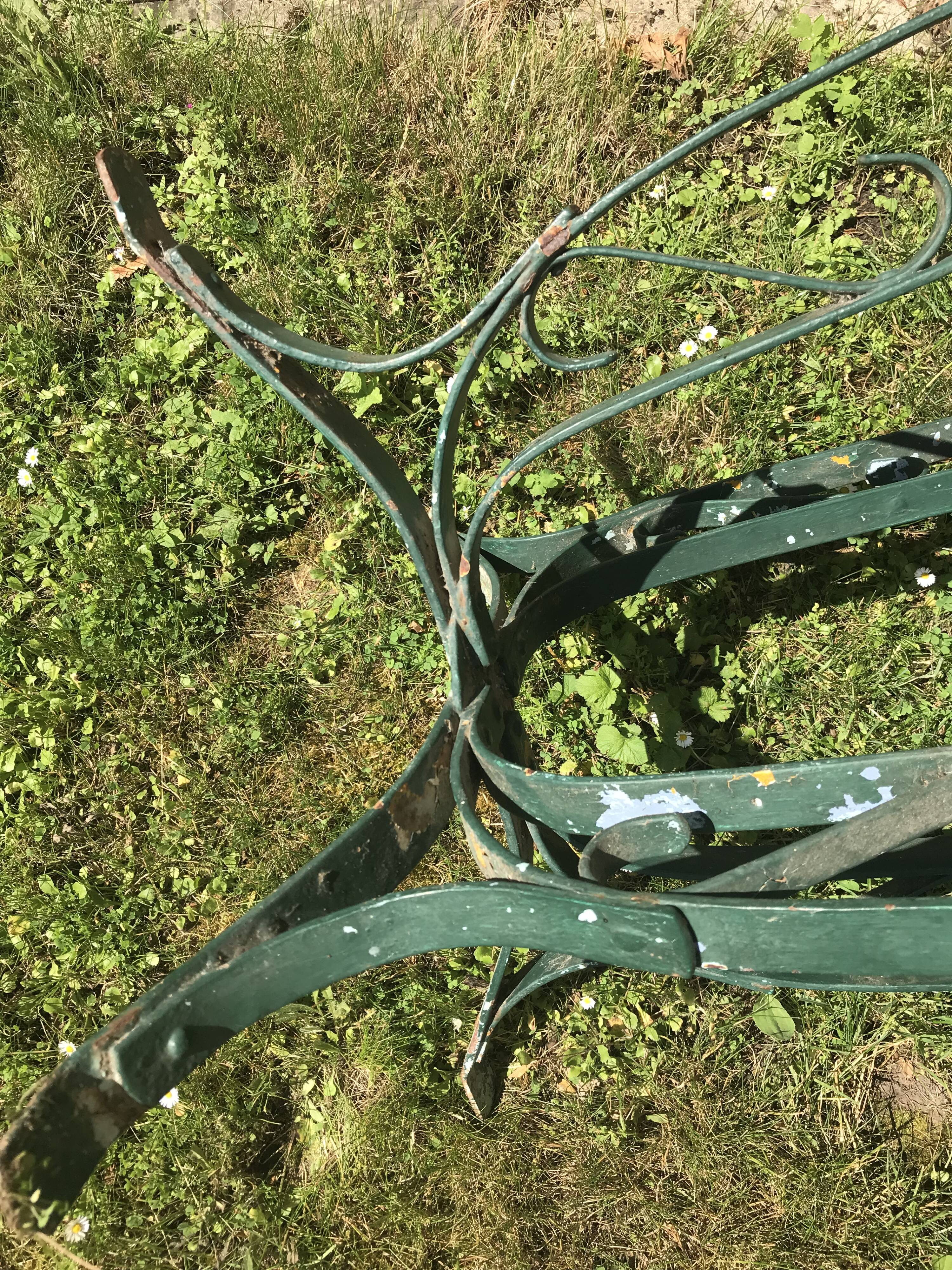 large antique iron table riveted