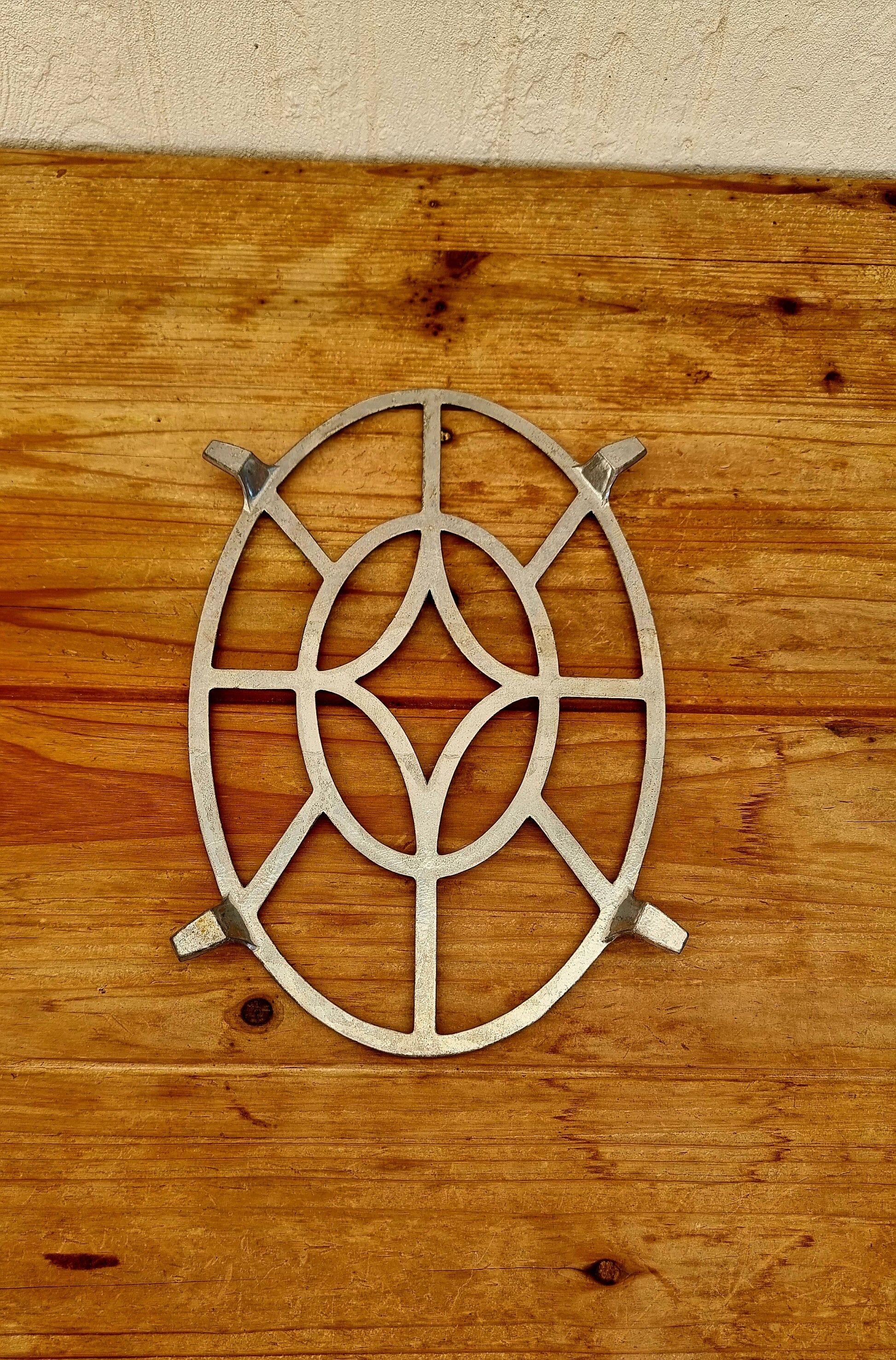 Vintage aluminium trivet