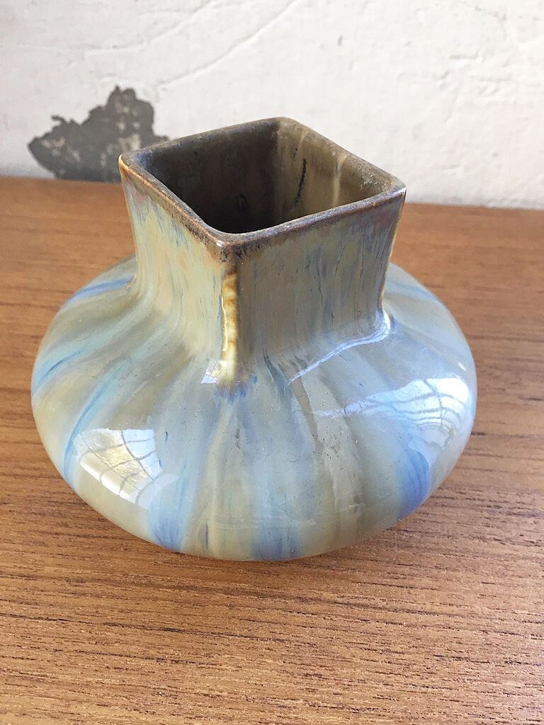 Small blue ceramic vase
