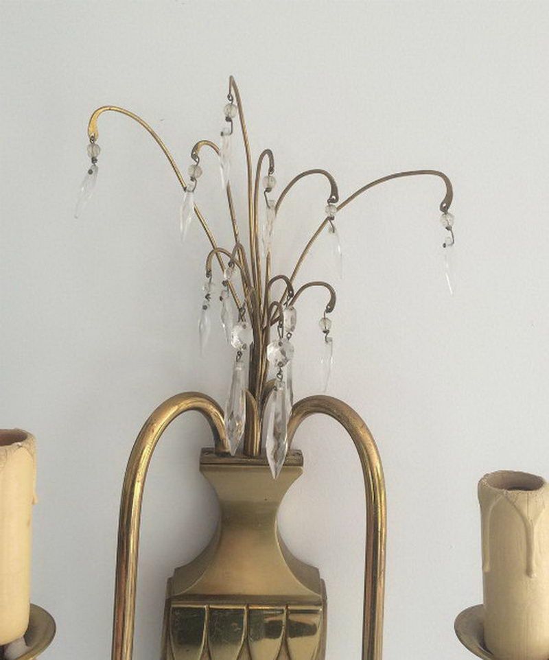 Pair of brass and crystal wall sconces