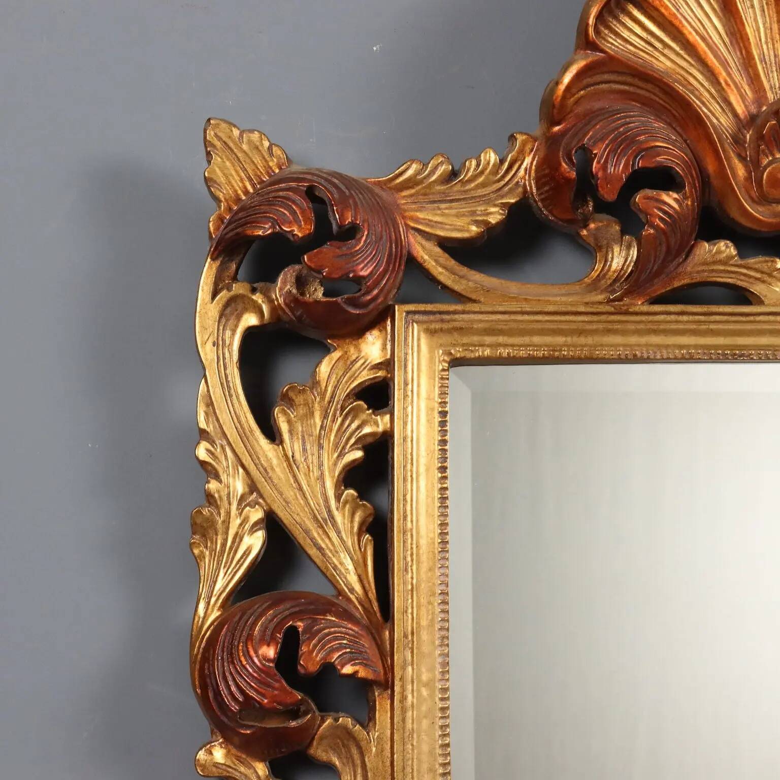 Antique baroque style mirror in carved wood, Italy, 20th century.