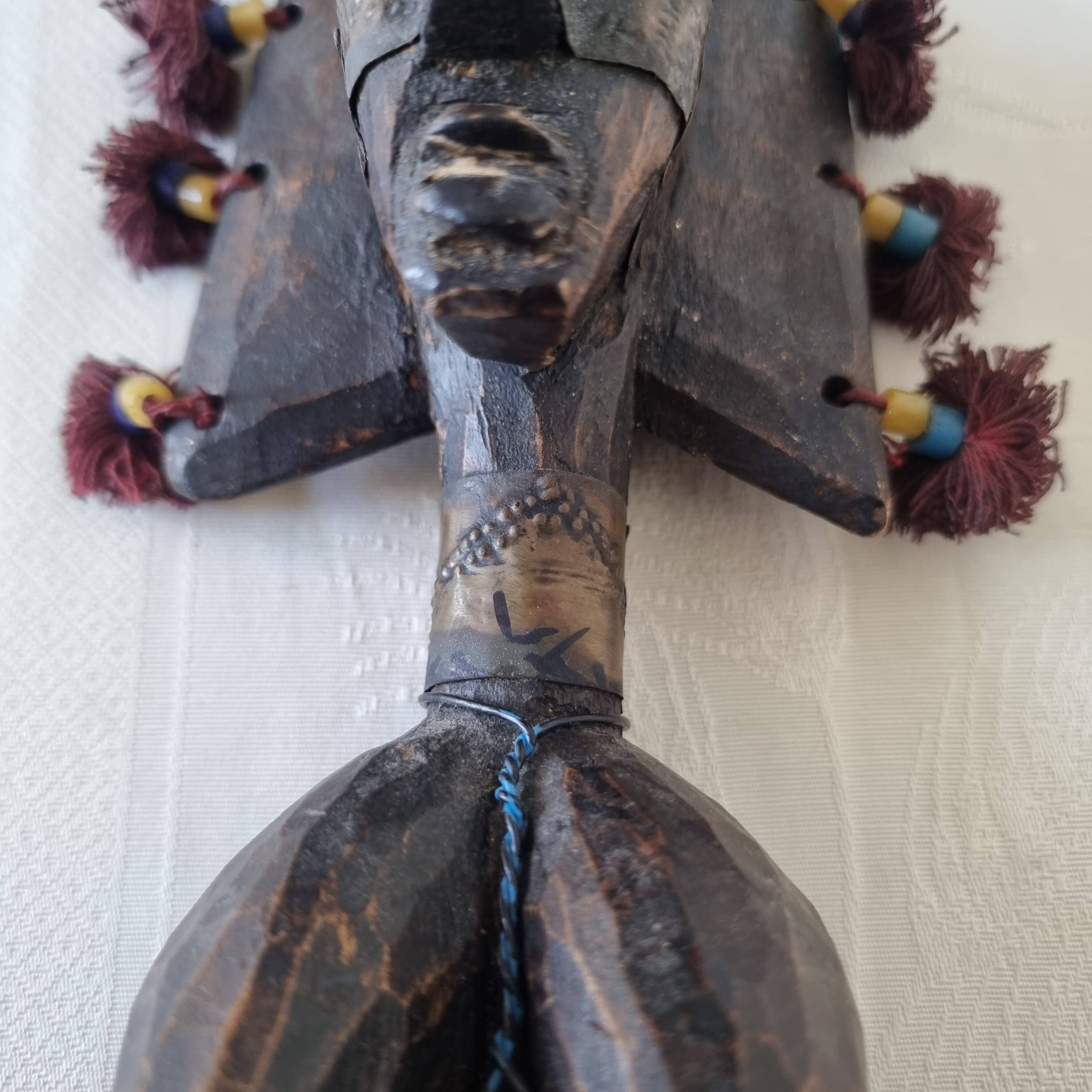 Scepter decorated with a female figure in wood and brass