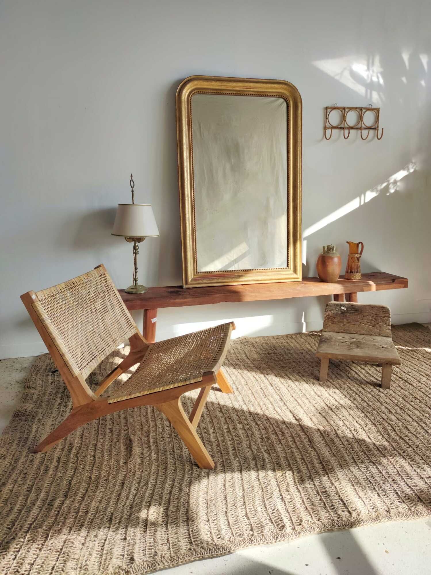 Reclining armchair in natural wood and woven rattan
