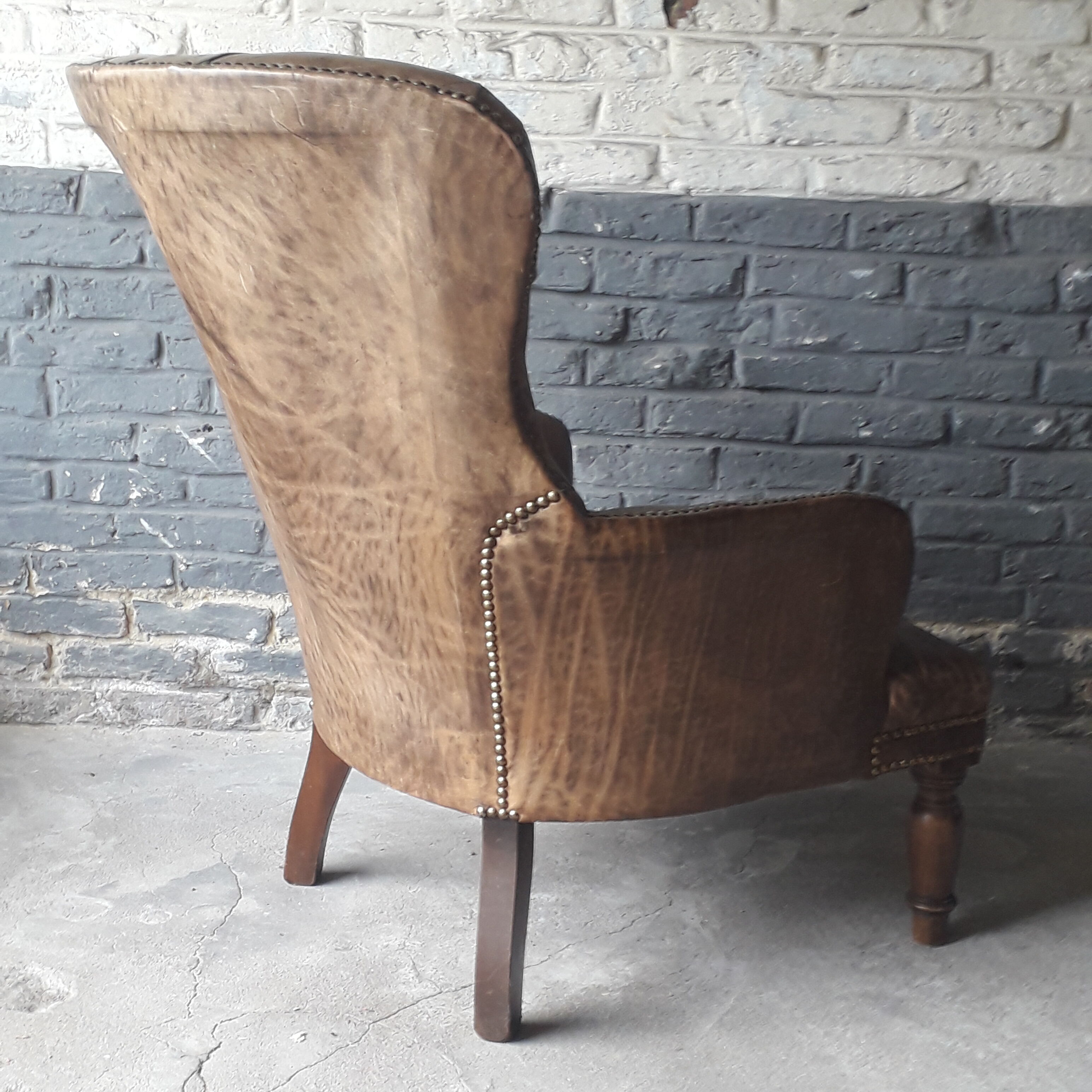 Antique Chesterfield armchair.