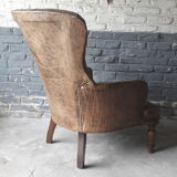 Antique Chesterfield armchair.
