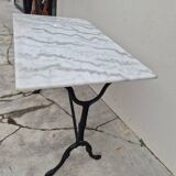 Antique marble and cast iron bistro restaurant table