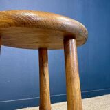 Pair of solid wood tripod stools with turned legs, 60s France