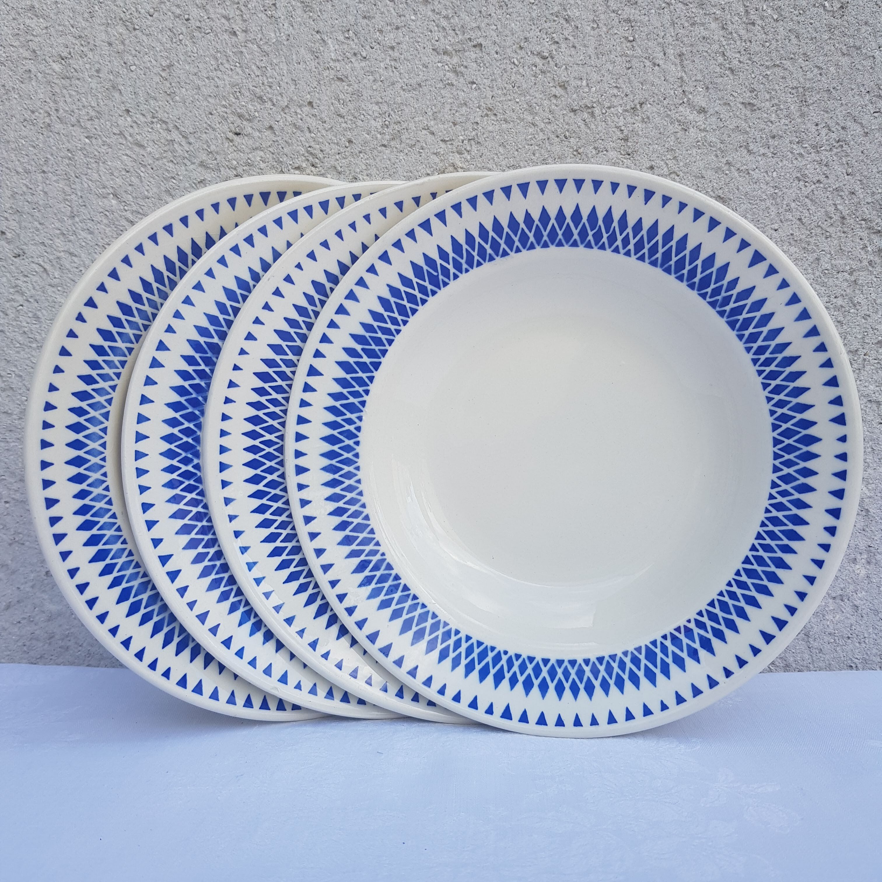 Badonviller Set of 4 hollow plates with blue geometric decoration