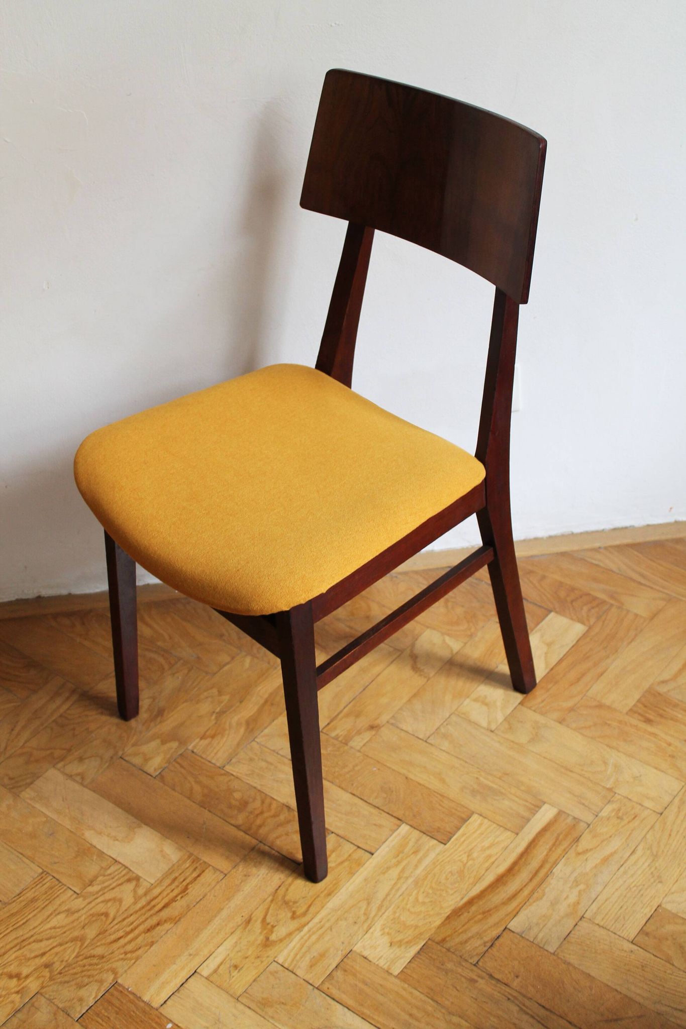 Vintage dining chair from the 1960s, Scandinavian style, wood and fabric.