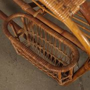 Vintage wicker armchair with magazine rack, Italy, 1960s