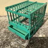 Vintage bird cage in green wood retro paint