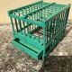 Vintage bird cage in green wood retro paint