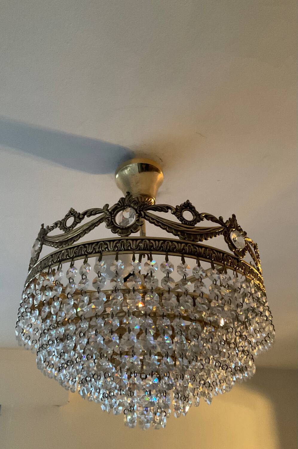 Vintage chandelier cascade of crystal and brass tassels