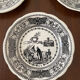 Set de 9 assiettes Gien « rébus « .