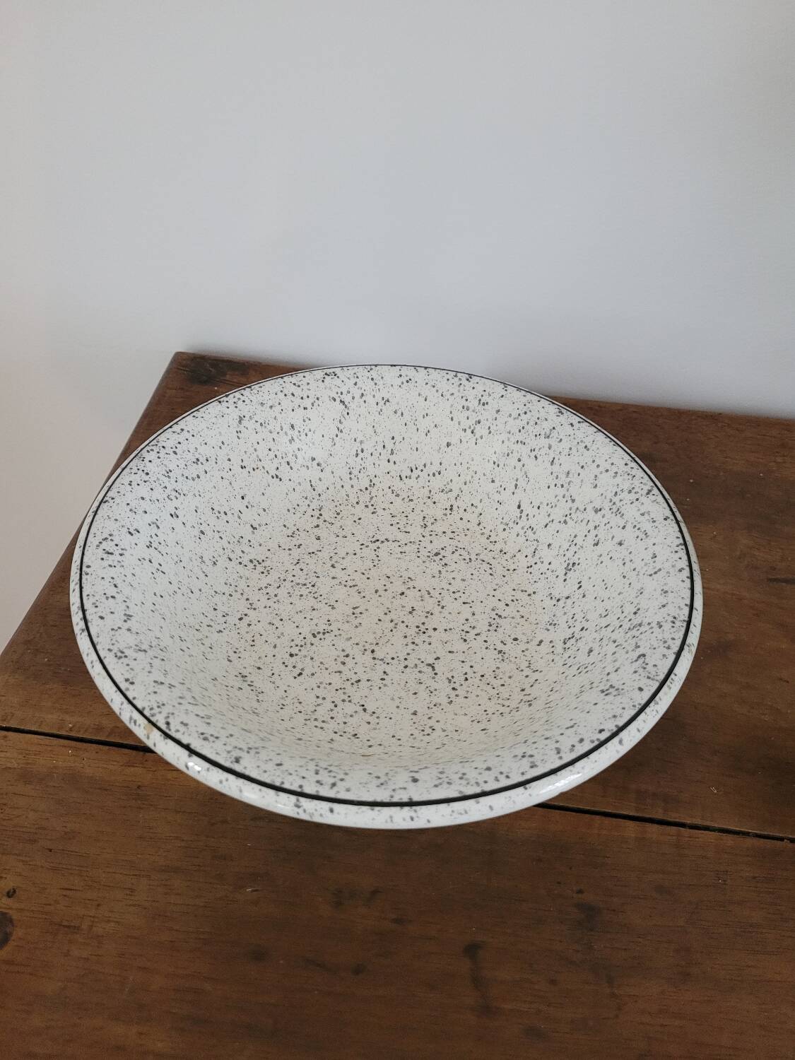 Black speckled soup plate