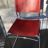 Chrome sled chair and red leather