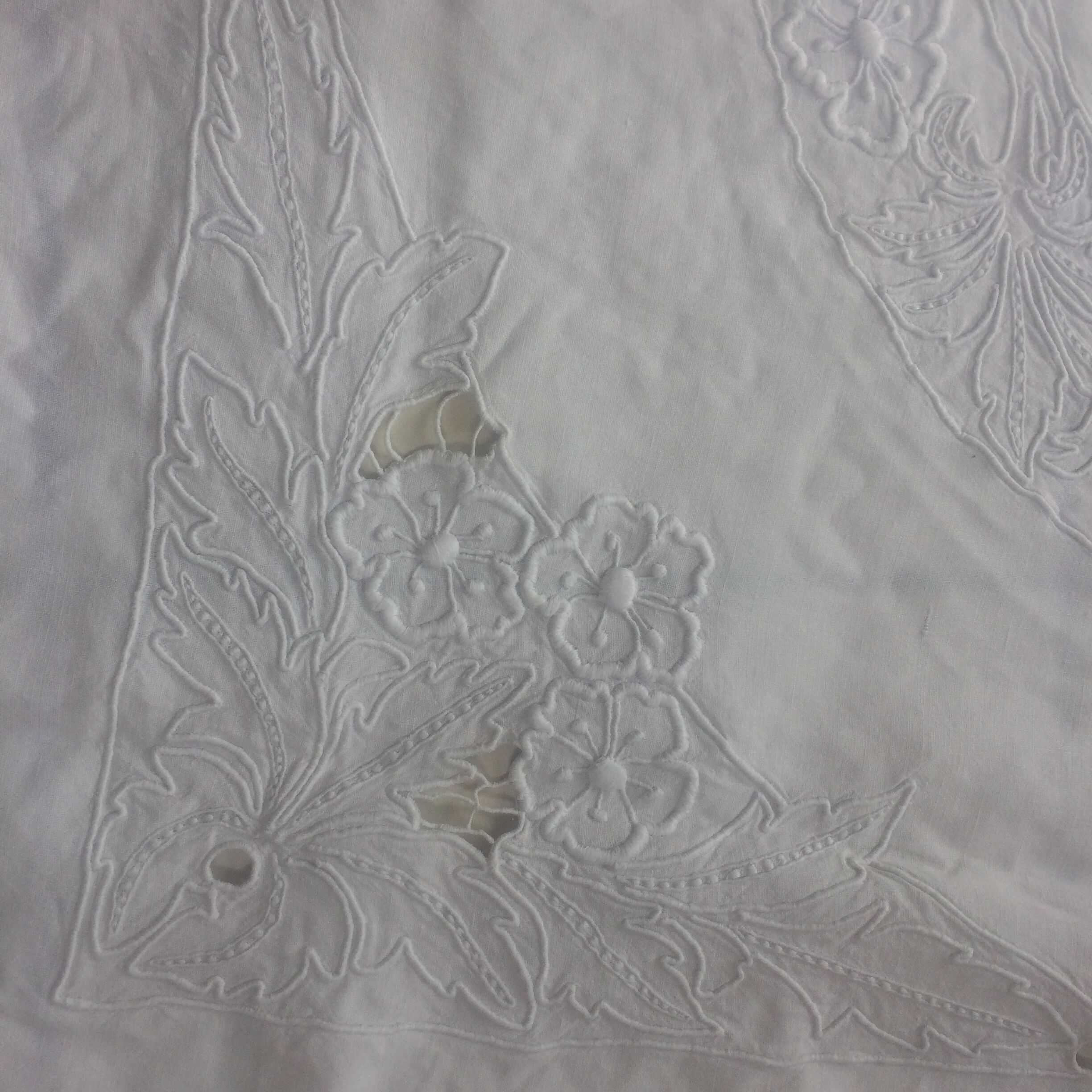 Old square nappee. Almost fully embroidered hand.