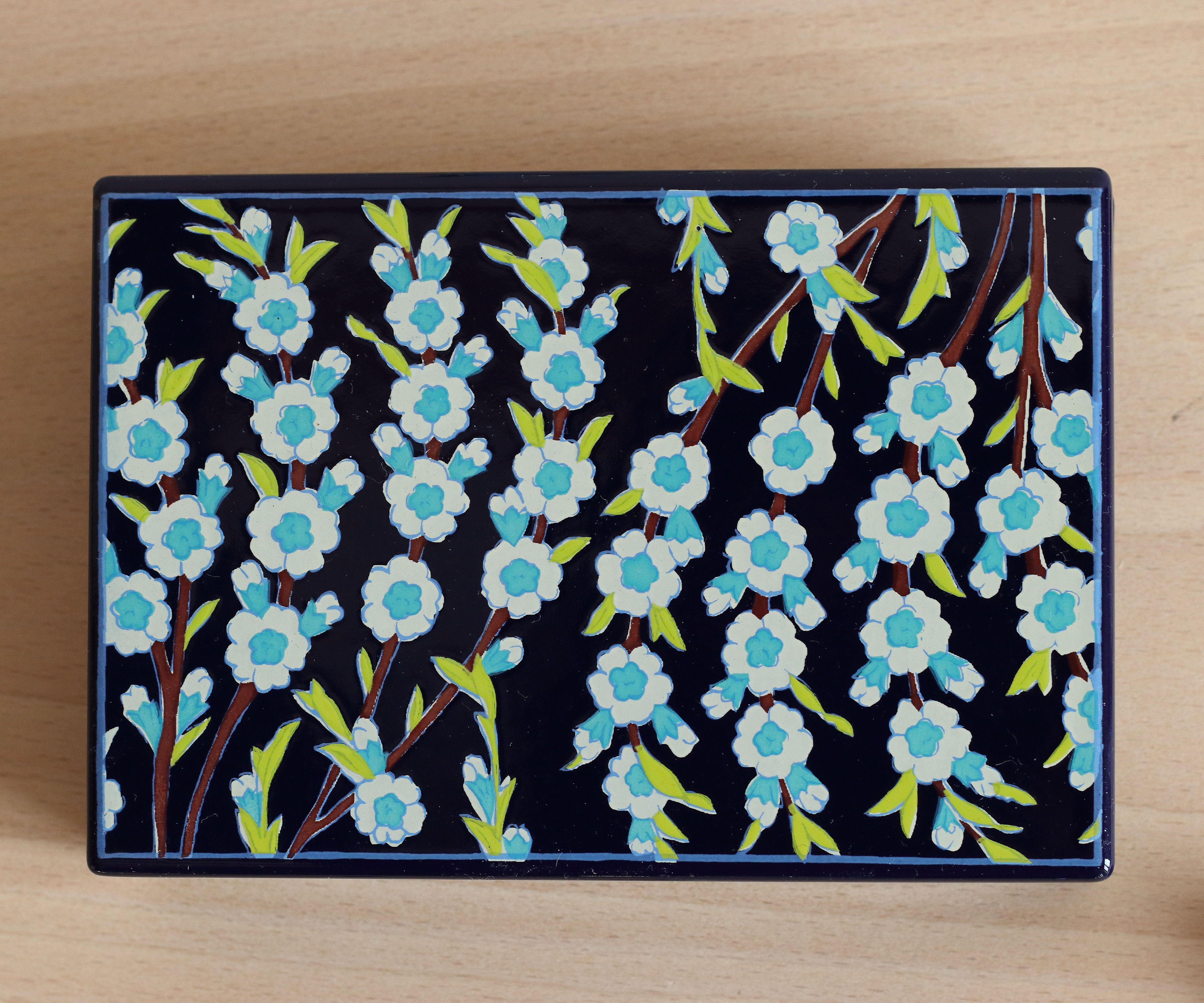 Enamelled sheet metal box floral pattern by Jean Neuhaus