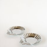Pair of worked stainless steel shell trinket trays, 1970