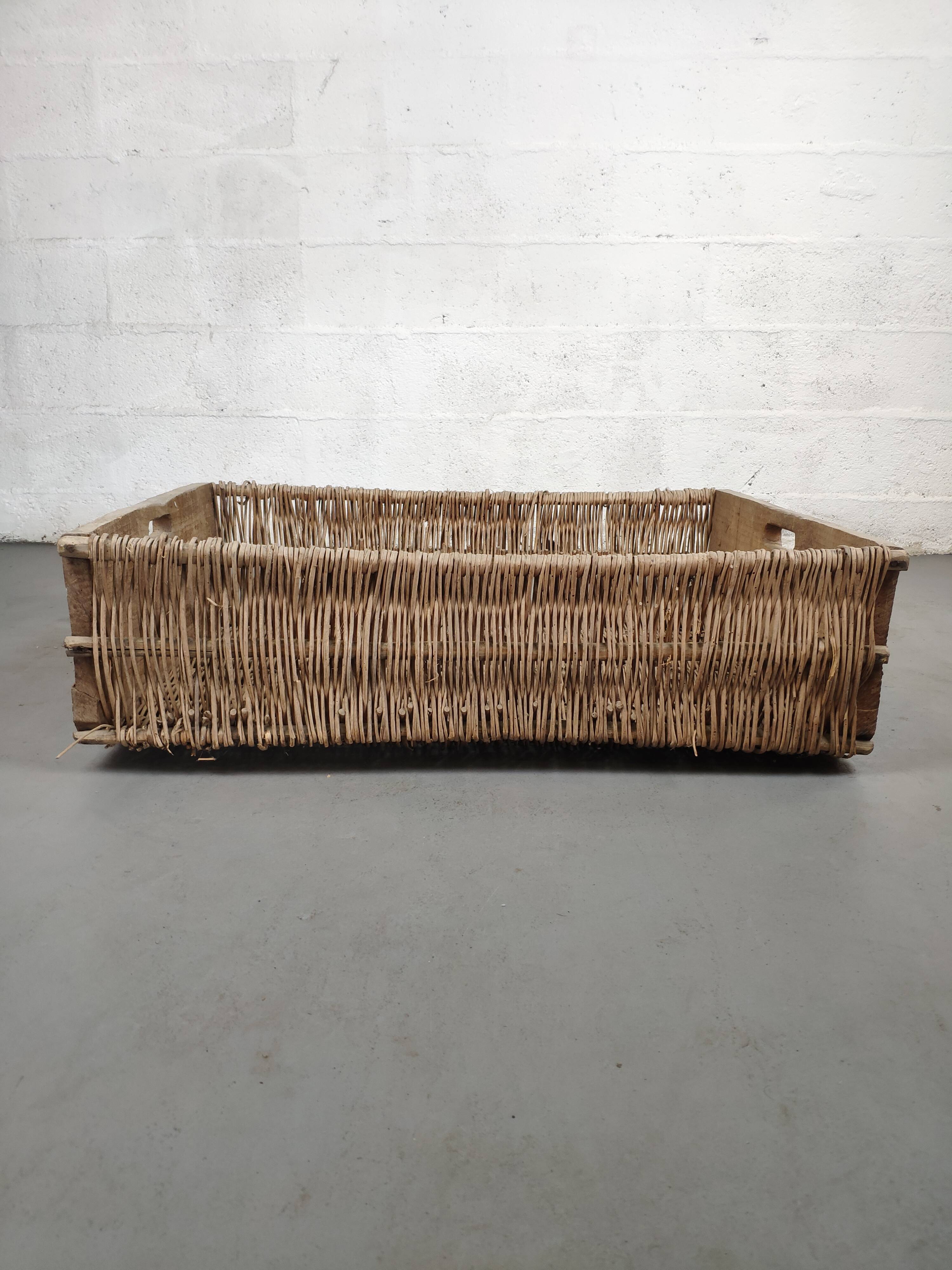 Set of 2 old large baskets with logs wood and wicker