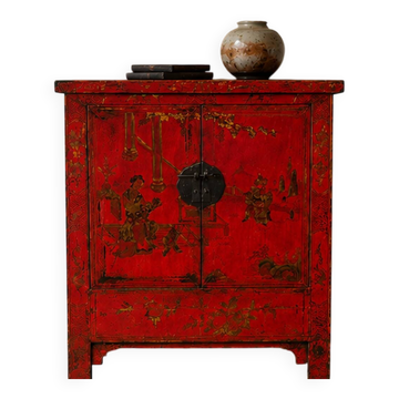 Antique Chinese red lacquer cabinet with hand-painted decorations.