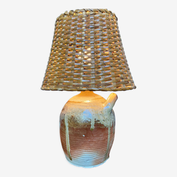 Table lamp in stoneware and rattan