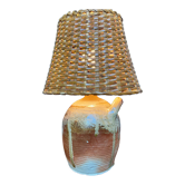 Lampe à poser en grès et rotin