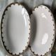 2 porcelain dishes with lions in the French Art Deco style