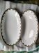 2 porcelain dishes with lions in the French Art Deco style