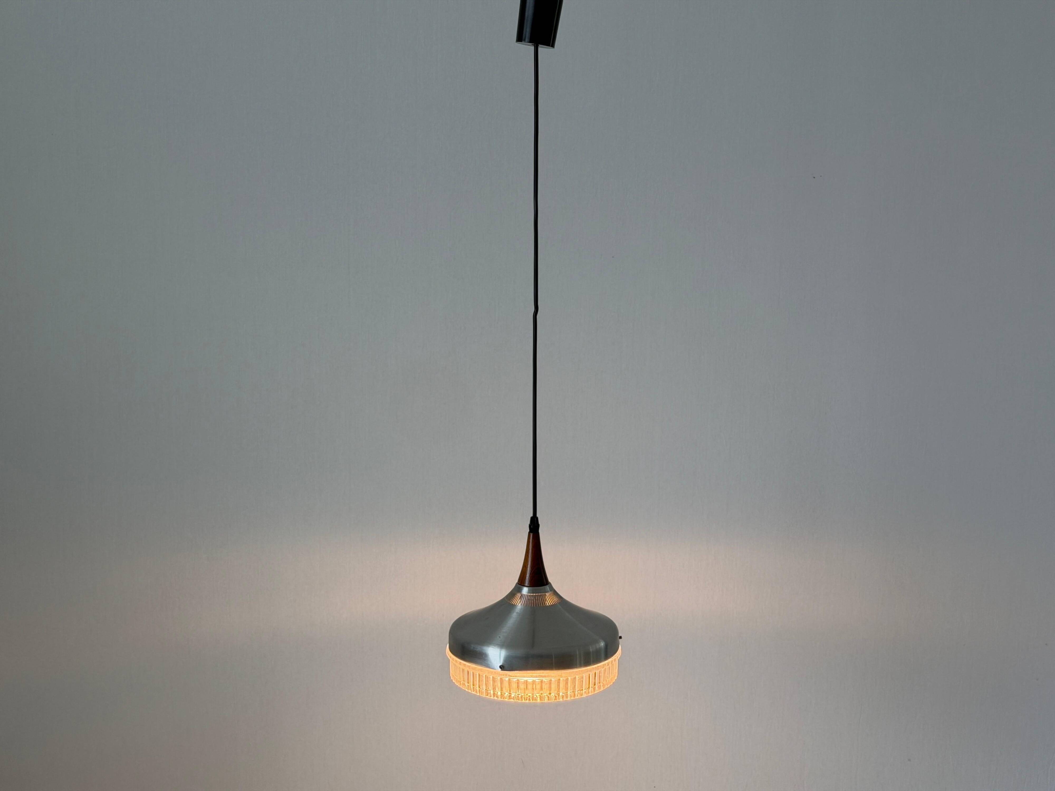 Crystal glass ceiling light with a metal frame and wood details, 1960s, Germany.