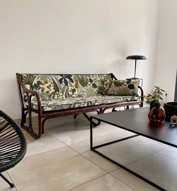 Vintage rattan bench from Maison Kok