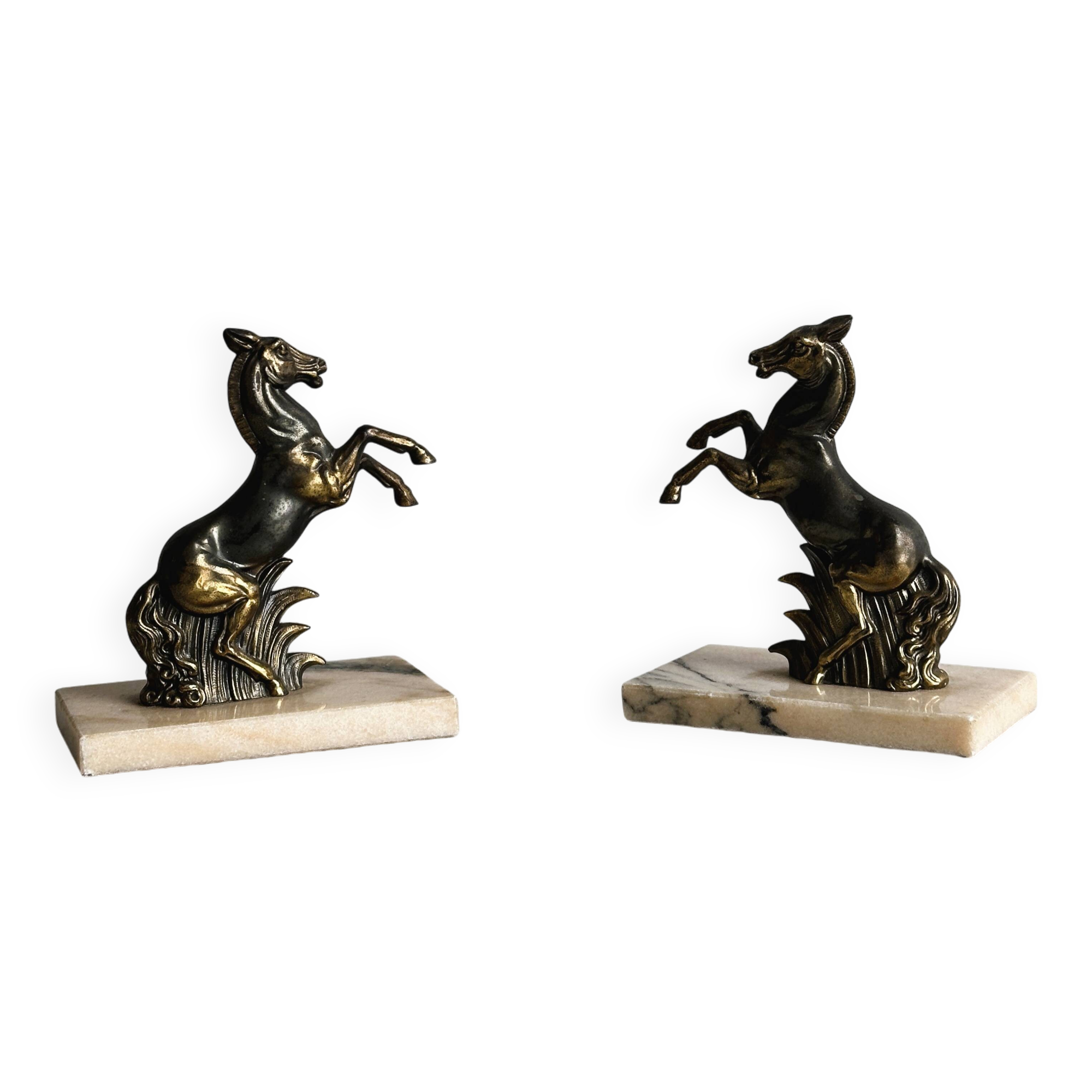 Paire de serre-livres en métal doré