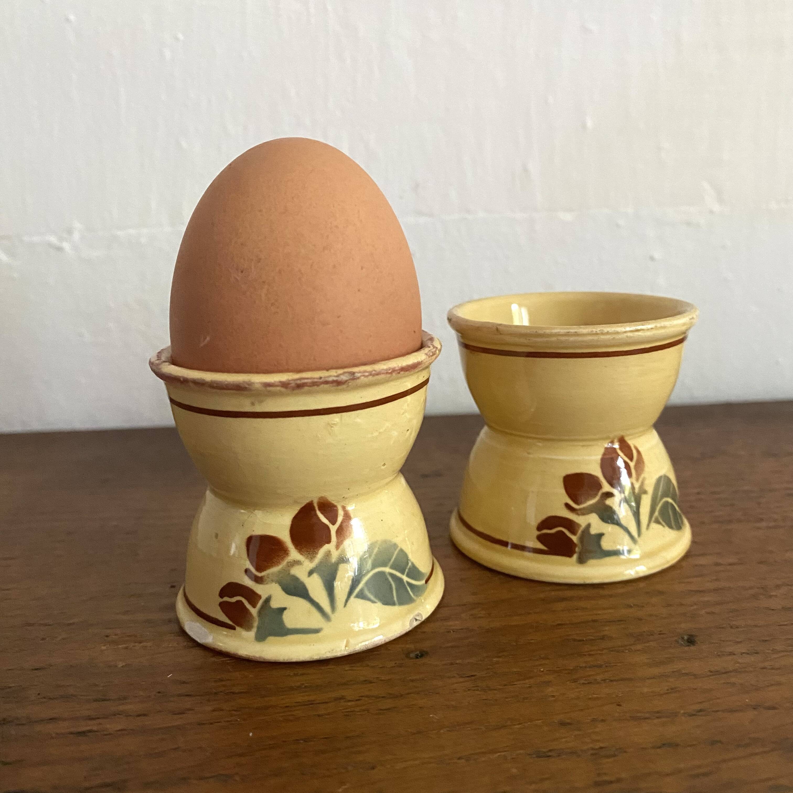 Antique diabolo egg cups
