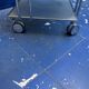 Chrome and glass shelving unit on wheels from the 90s.