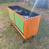 Sideboard with green sliding doors, circa 1950