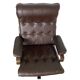Vintage Scandinavian armchair in curved wood and leather