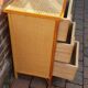 Commode tressée en rotin